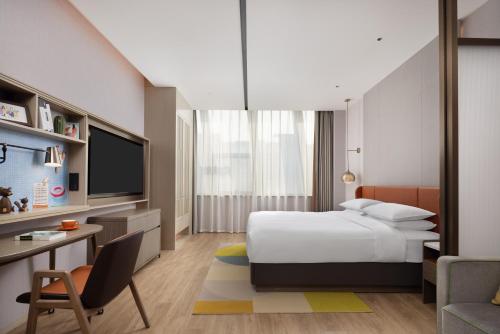 Imagen de la habitación del Hotel Home2 Suites by Hilton Beijing Shunyi. Foto 19