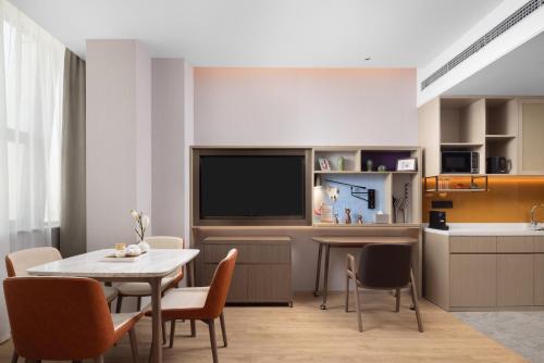 Imagen de la habitación del Hotel Home2 Suites by Hilton Beijing Shunyi. Foto 20
