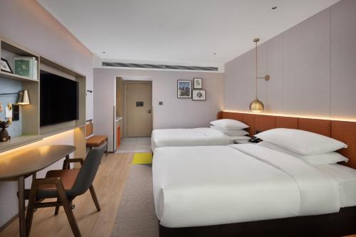 Imagen de la habitación del Hotel Home2 Suites by Hilton Beijing West Station. Foto 3
