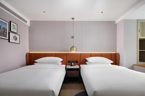 Imagen de la habitación del Hotel Home2 Suites by Hilton Beijing West Station. Foto 4
