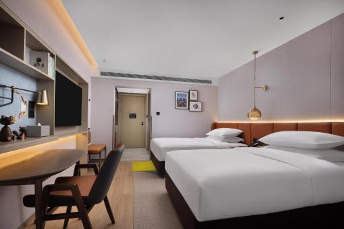 Imagen de la habitación del Hotel Home2 Suites by Hilton Beijing West Station. Foto 8