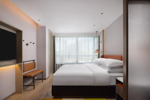 Imagen de la habitación del Hotel Home2 Suites by Hilton Beijing West Station. Foto 11
