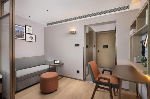 Imagen de la habitación del Hotel Home2 Suites by Hilton Beijing West Station. Foto 12