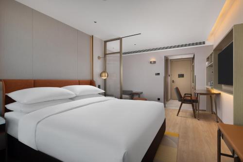 Imagen de la habitación del Hotel Home2 Suites by Hilton Beijing West Station. Foto 13