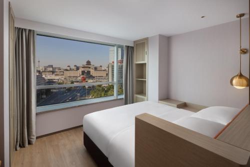 Imagen de la habitación del Hotel Home2 Suites by Hilton Beijing West Station. Foto 15