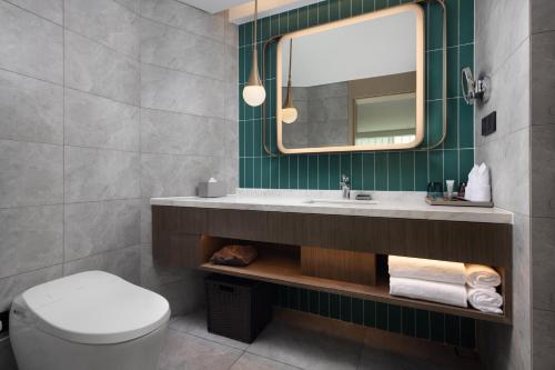 Imagen de la habitación del Hotel Home2 Suites by Hilton Beijing West Station. Foto 16