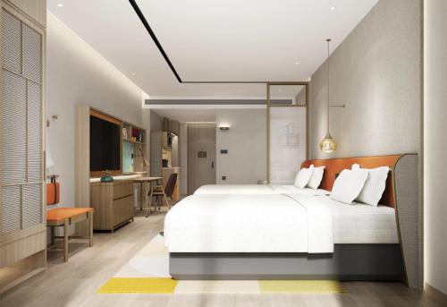 Imagen de la habitación del Hotel Home2 Suites by Hilton Guangzhou Baiyun Airport West. Foto 9