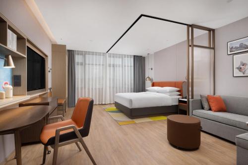 Imagen de la habitación del Hotel Home2 Suites by Hilton Guangzhou Baiyun Airport West. Foto 11