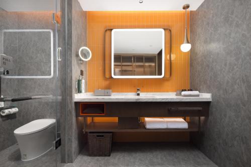 Imagen de la habitación del Hotel Home2 Suites by Hilton Guangzhou Baiyun Airport West. Foto 15