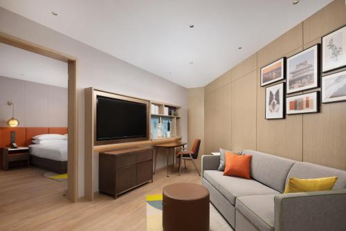Imagen de la habitación del Hotel Home2 Suites by Hilton Guangzhou Baiyun Airport West. Foto 16
