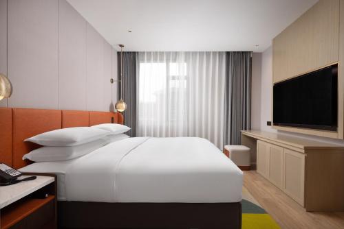 Imagen de la habitación del Hotel Home2 Suites by Hilton Guangzhou Baiyun Airport West. Foto 20