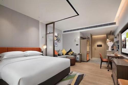 Imagen de la habitación del Hotel Home2 Suites by Hilton Nanning. Foto 10