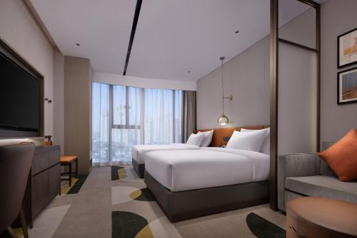 Imagen de la habitación del Hotel Home2 by Suite Wuhan Qingshan. Foto 20