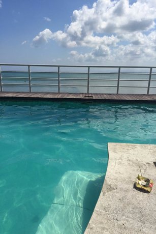 Imagen de la piscina del Hotel Home@36 Condotel. Foto 12