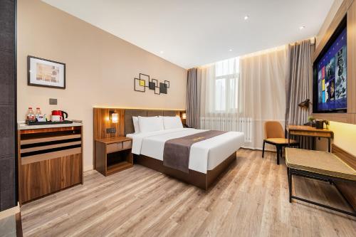 Imagen de la habitación del Hotel HomeInn Selection Harbin Central Street Sophia Church. Foto 13