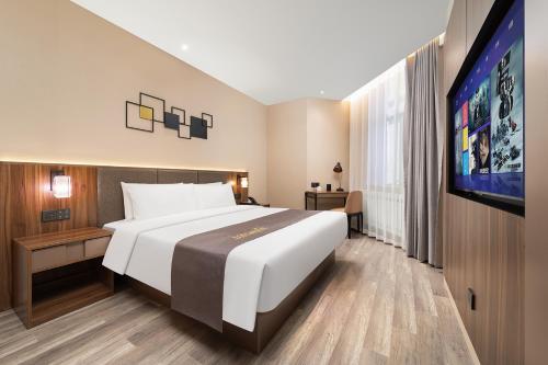 Imagen de la habitación del Hotel HomeInn Selection Harbin Central Street Sophia Church. Foto 14