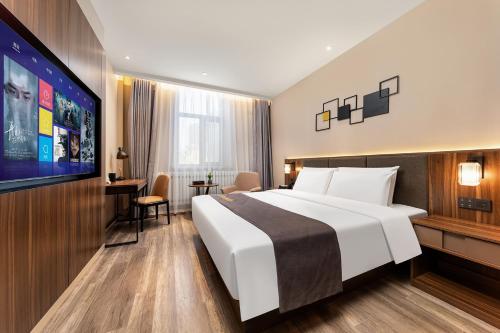 Imagen de la habitación del Hotel HomeInn Selection Harbin Central Street Sophia Church. Foto 16