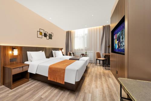 Imagen de la habitación del Hotel HomeInn Selection Harbin Central Street Sophia Church. Foto 18