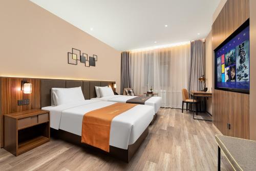Imagen de la habitación del Hotel HomeInn Selection Harbin Central Street Sophia Church. Foto 20