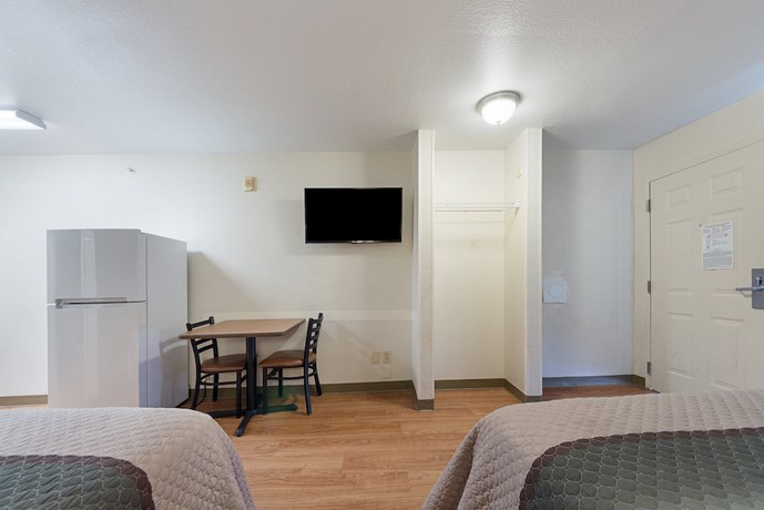 Imagen de la habitación del Hotel HomeTowne Studios by Red Roof Dallas - Irving. Foto 13