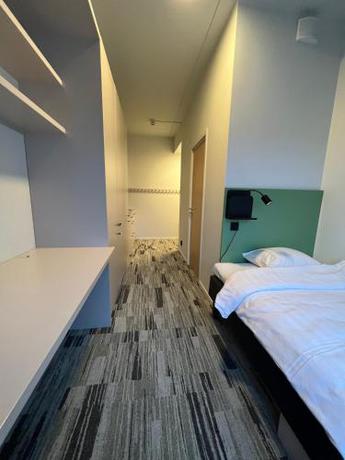 Imagen de la habitación del Hotel HomeX Gamers. Foto 19