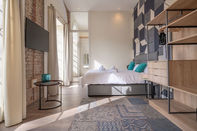 Imagen de la habitación del Hotel Homeart Apartments Malaga. Foto 12