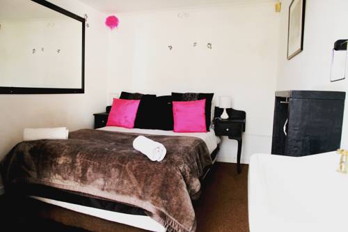 Imagen de la habitación del Hotel Homebase Melville Backpackers. Foto 2