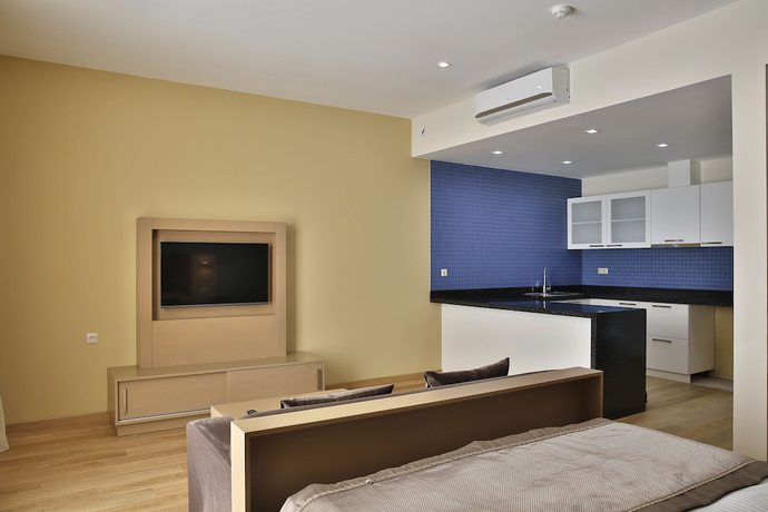 Imagen de la habitación del Hotel Homebridge Apartments. Foto 12