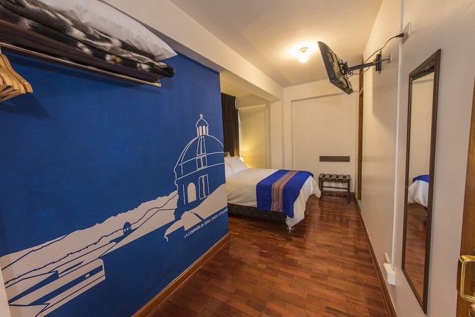 Imagen de la habitación del Hotel Homees - Casa Arcopunco. Foto 16