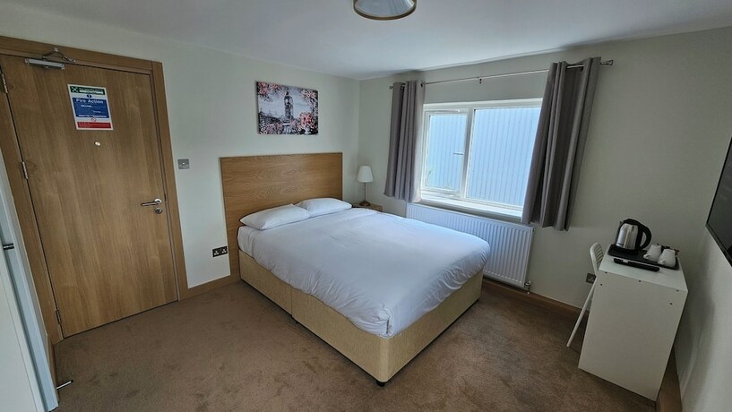 Imagen de la habitación del Hotel Homefield Lodge. Foto 17