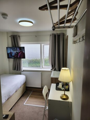 Imagen de la habitación del Hotel Homefield Lodge. Foto 19