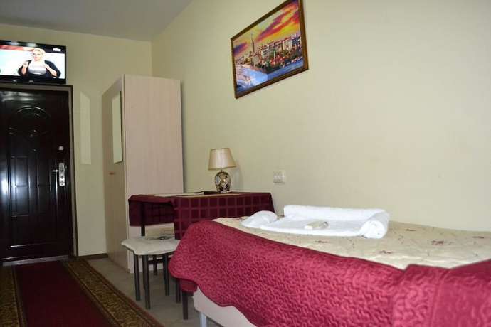 Imagen de la habitación del Hotel Homehotel. Foto 17