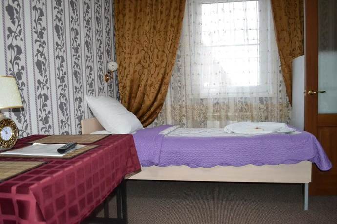 Imagen de la habitación del Hotel Homehotel. Foto 18