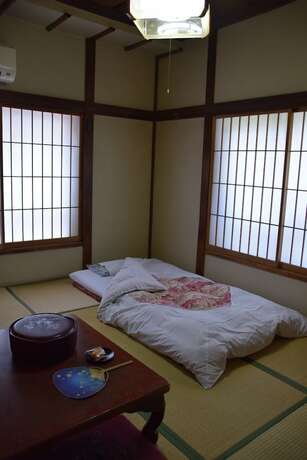 Imagen de la habitación del Hotel Homeikan Morikawa Annex. Foto 17