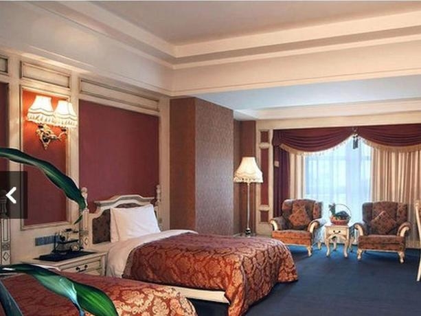 Imagen de la habitación del Hotel Homeland International. Foto 5