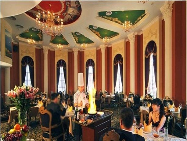 Imagen del bar/restaurante del Hotel Homeland International. Foto 4