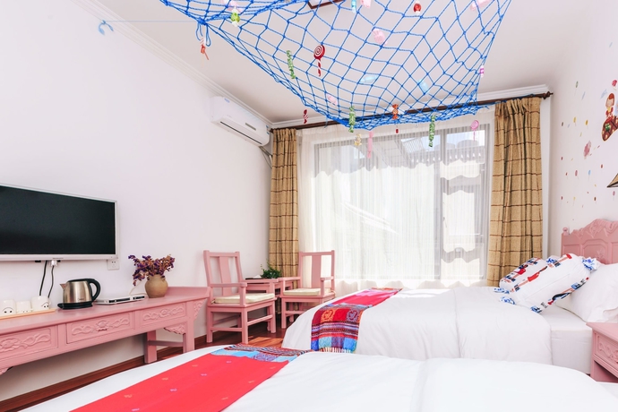 Imagen de la habitación del Hotel Homelife Theme Inn Dali. Foto 7