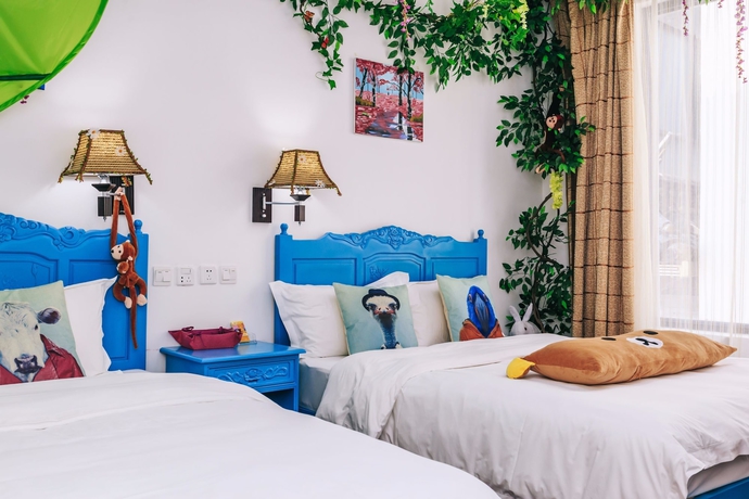 Imagen de la habitación del Hotel Homelife Theme Inn Dali. Foto 8