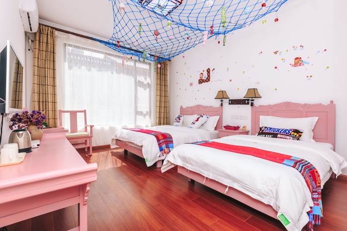 Imagen de la habitación del Hotel Homelife Theme Inn Dali. Foto 10