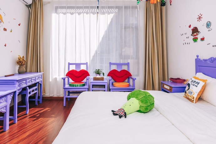 Imagen de la habitación del Hotel Homelife Theme Inn Dali. Foto 12