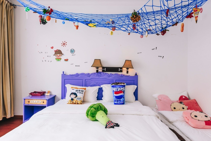 Imagen de la habitación del Hotel Homelife Theme Inn Dali. Foto 14