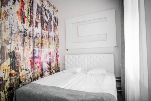 Imagen de la habitación del Hotel Homelike. Foto 7
