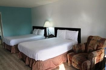 Imagen de la habitación del Hotel Homelodge. Foto 5
