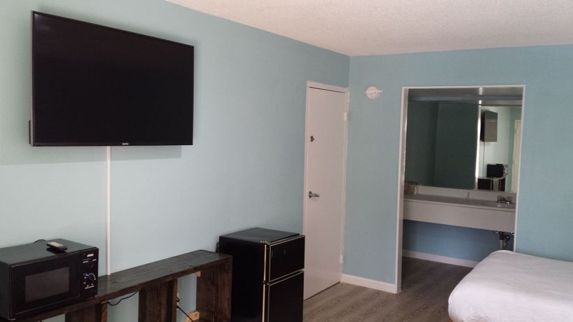 Imagen de la habitación del Hotel Homelodge. Foto 6