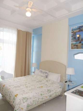 Imagen de la habitación del Hotel Homely Studios. Foto 11