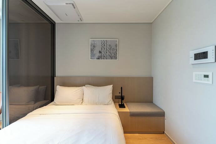 Imagen de la habitación del Hotel Homes Stay Myeongdong. Foto 13