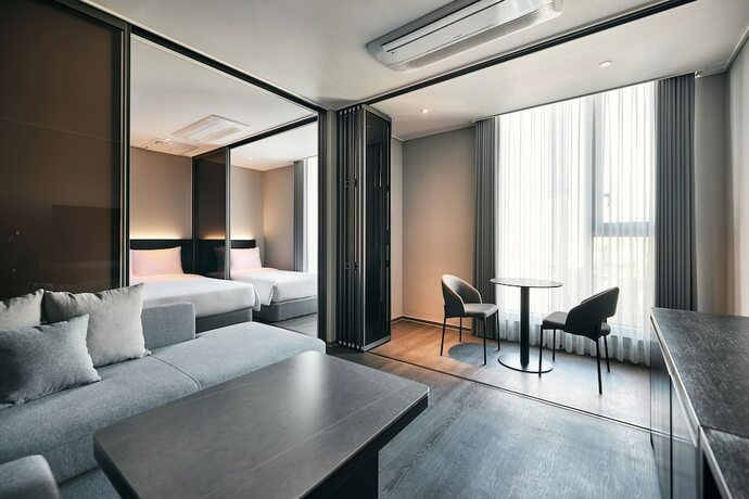 Imagen de la habitación del Hotel Homes Stay Myeongdong. Foto 15