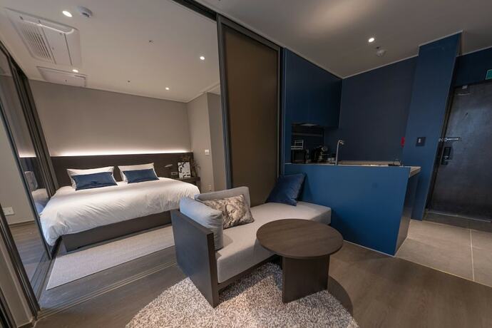 Imagen de la habitación del Hotel Homes Stay Myeongdong. Foto 16
