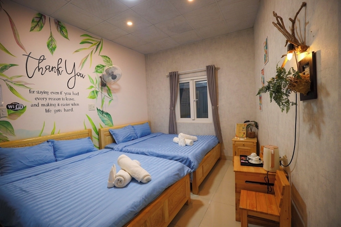 Imagen de la habitación del Hotel Homestay 3M House. Foto 6