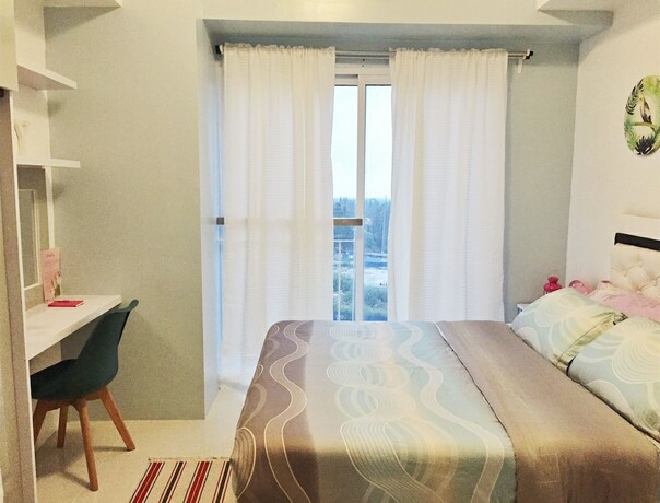 Imagen general del Hotel Homestay At Wind Residences. Foto 11